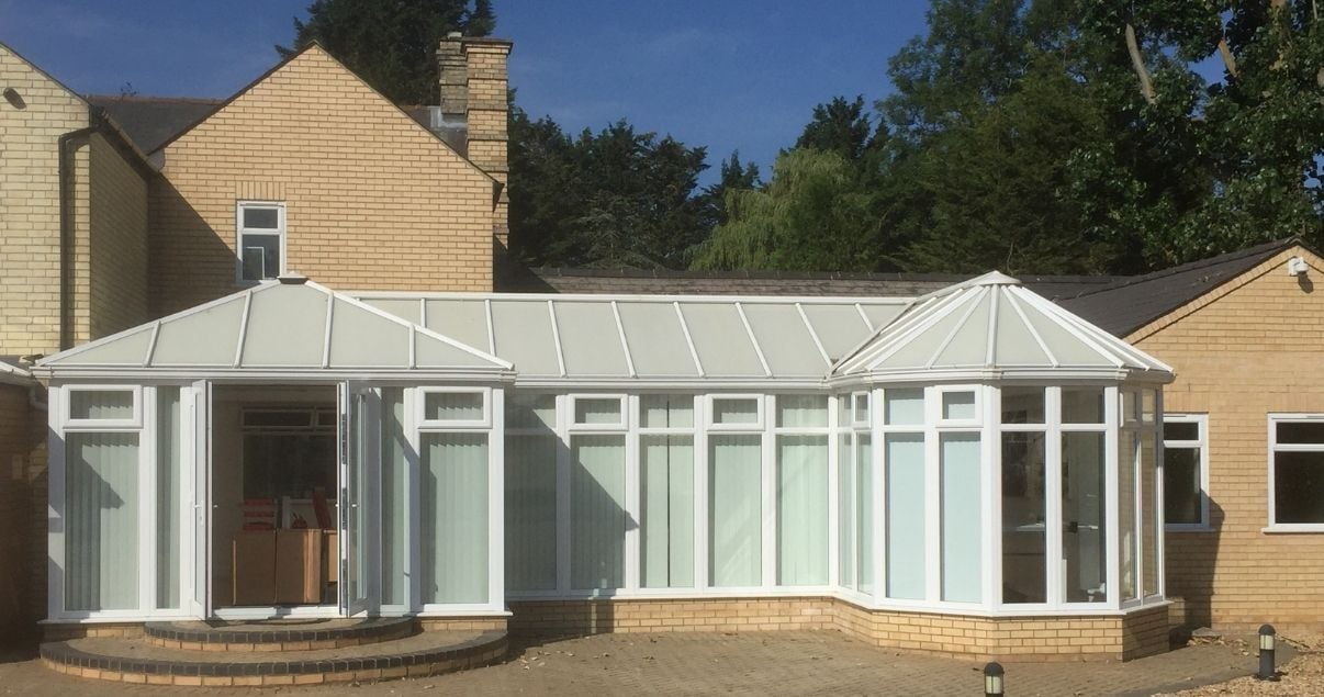 a conservatory with a polycarbonate roof may cause leaks and does not fare well with rough weather